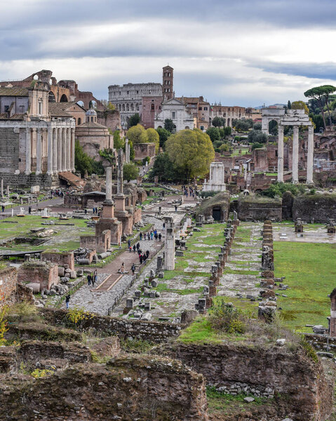 Rome, Italy - 27 Nov, 2022: The Temple of Saturn and views along the Roman Forum