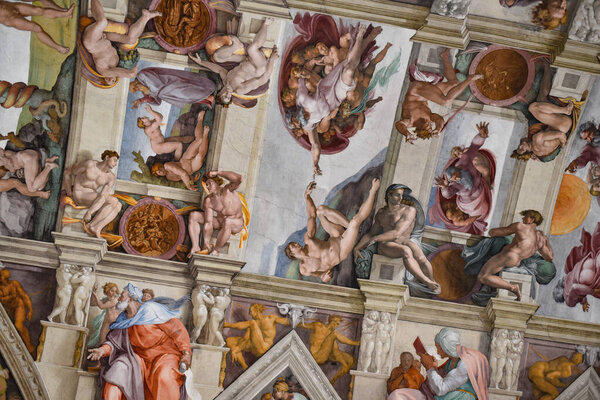 Rome, Italy - 27 Nov 2022: The iconic image of the Hand of God giving life to Adam. Sistine Chapel, Vatican Museum