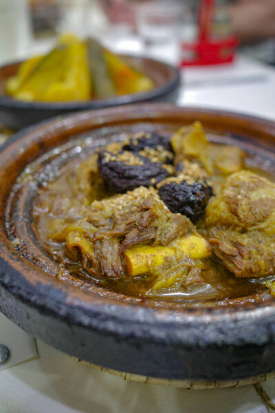 Marrakech, Morocco - 21 Feb 2023: Traditional Moroccan Tagine dishes with lamb, meat and vegetables