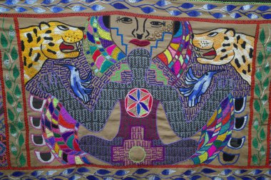 Lima, Peru - Dec 3, 2023: Traditonal Amazonian Shipibo Konibo art designs on paintings and textiles clipart