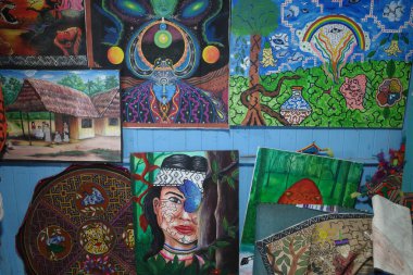Lima, Peru - Dec 3, 2023: Traditonal Amazonian Shipibo Konibo art designs on paintings and textiles clipart