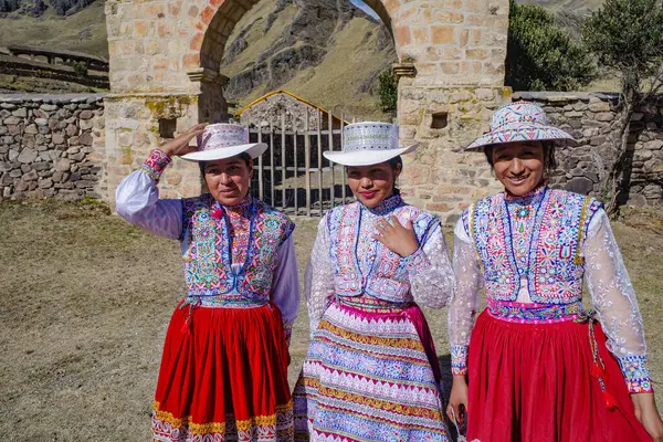 stock image Sibayo, Peru - Dec 5, 2023: Girls in traditional dress in the village of Sibayo, Colca Valley, Arequipa