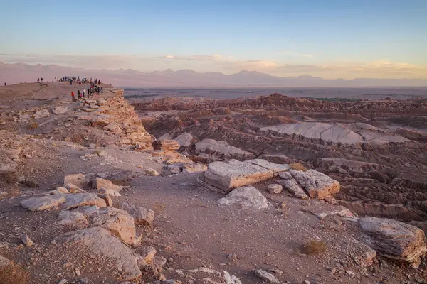 stock image San Pedro de Atacama, Chile - Nov 29, 2023: Tourists watching sunset views over the Valle de la Luna (Moon Valley), Atacama Desert