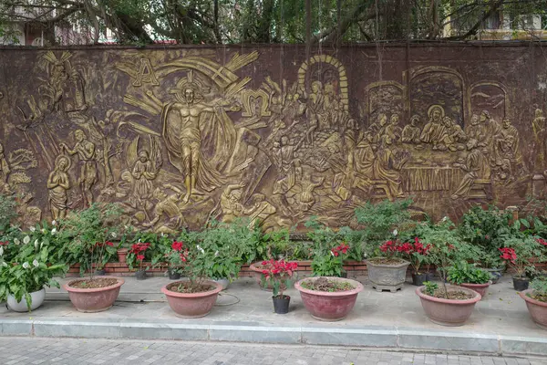 stock image Hanoi, Vietnam - 9 Feb, 2024: Catholic mural on display outside the St Joseph's Cathedral, Hanoi