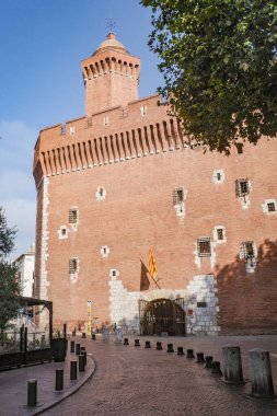 Perpignan, France - 27 Aug, 2024: Castillet tower hosting a museum of history and culture clipart