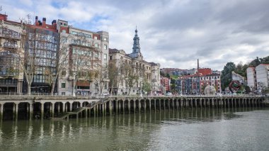 Bilbao, Spain - 16 Dec, 2024: Views of the Casco Viejo from the Nervion River in the old town of Bilbao, Basque Country clipart