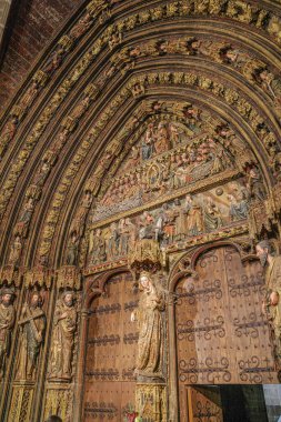 Laguardia, Spain - 28 Dec, 2024: Portico entrance to the Santa Maria de los Reyes catholic church, Laguardia, Alava clipart