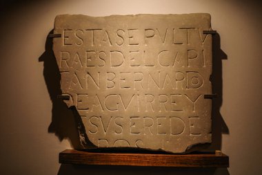 San Sebastian, Spain - 9 Feb 2025: Traditional Funerary Steles and Tombstones inside the San Telmo Museum, San Sebastian, Basque Country clipart