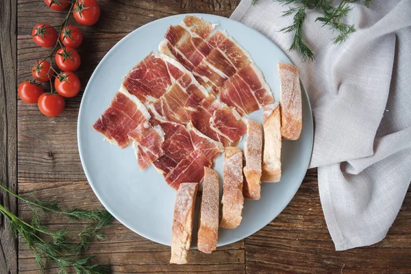 Stock image sliced bacon on a plate 