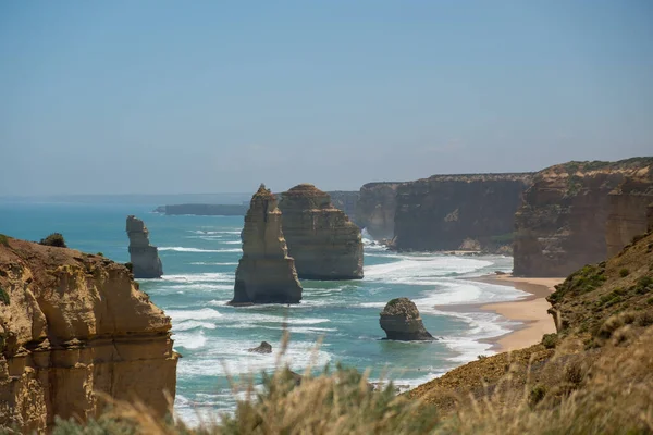 Twelve apostles rock formations at the great ocean road in sunny weather with a blue sky, Victoria, Australia