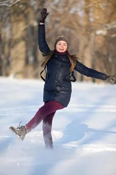 Happy Young Woman Smiling Throwing Snow Snowy Winter Park Sunny — Stock Photo, Image