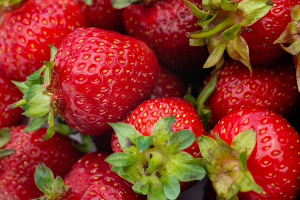 stock image Red background of ripe strawberries. Close up, top view.