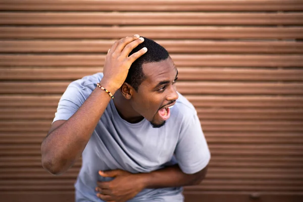 Portrait Excited Young African American Guy Looking Away Hand Head — Stock Photo, Image