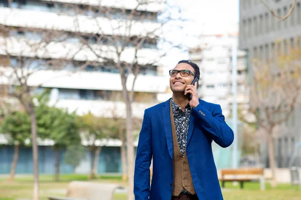Portrait Stylish Young Businessman Talking Cell Phone Looking While Walking — Stock Photo, Image