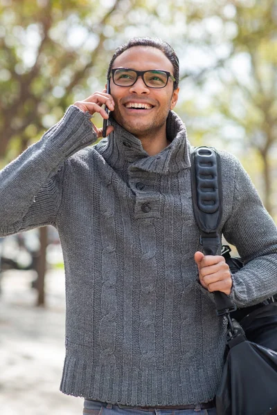 Portrait Stylish Young Man Talking Cell Phone Carrying Bag — Stock Photo, Image