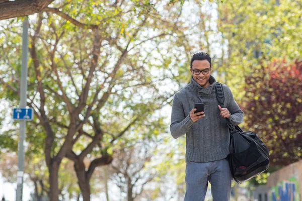 Portrait Happy Young African American Man Texting Mobile Phone Carrying — Stock Photo, Image