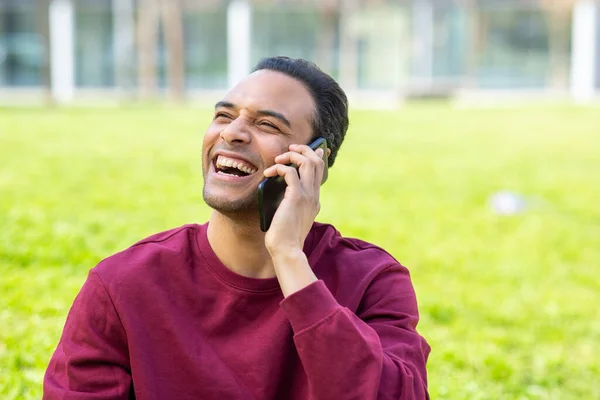 Portrait Happy Young African Man Sitting Park Talking Mobile Phone — Stock Photo, Image