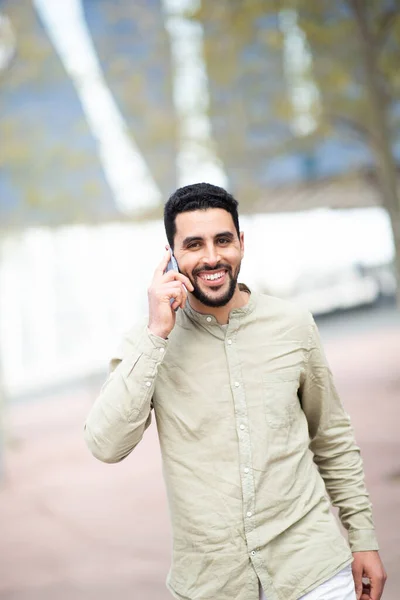 Portrait Cheerful Young Arab Man Talking Cellphone Walking City — Stock Photo, Image