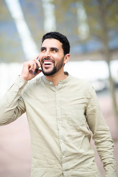 Portrait Smiling Young Middle Eastern Man Talking Mobile Phone Walking — Stock Photo, Image