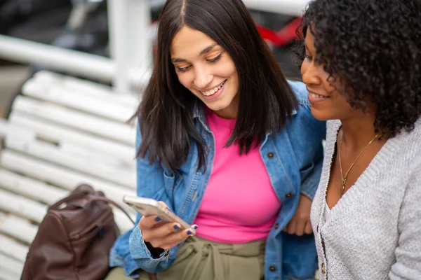 Portrait Two Women Sitting Together Looking Mobile Phone — Stock Photo, Image
