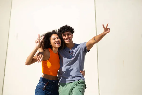 Portrait of two happy young people boy and girl together