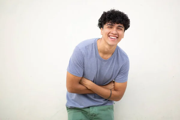 Portrait Young Man Laughing White Wall Arms Crossed — Stock Photo, Image