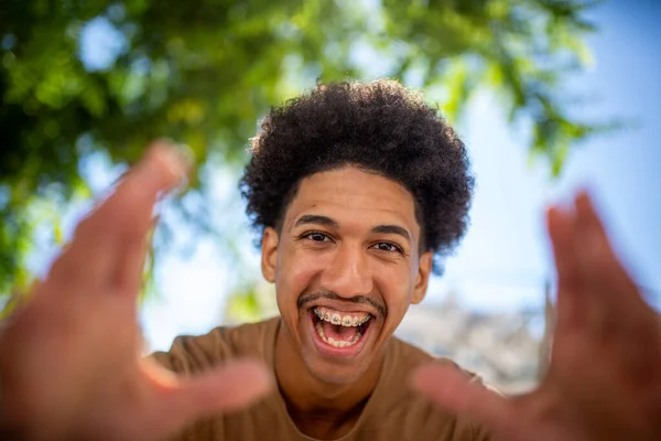 Close Portrait Happy Young African American Man Hands Forward — Stok Foto