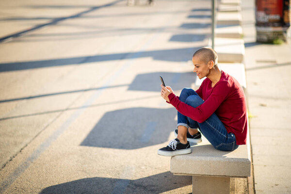 Portrait Woman Sitting City Using Mobile Phone Stock Picture