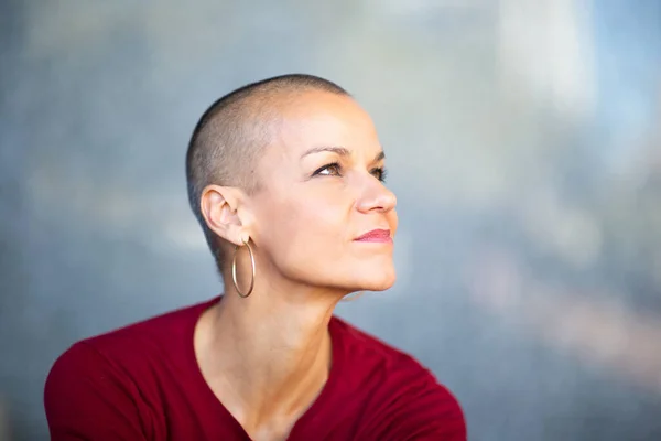 Close Portrait Woman Shaved Head Looking Away Royalty Free Stock Images