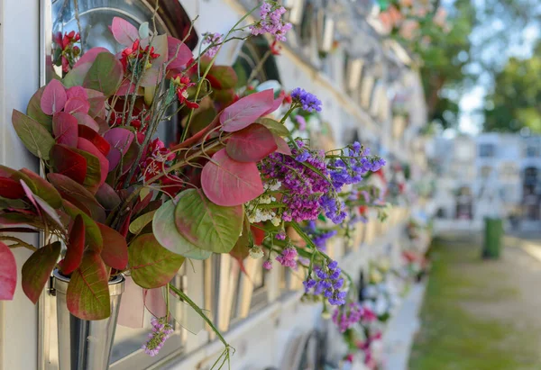 Detail of a bouquet of flowers in a cemetery