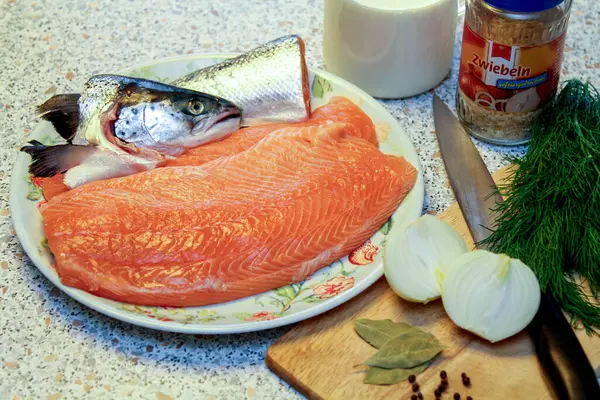 Salmon Fillet, Head. Spices, Onion and Milk. Butchering Whole Salmon. Filleting Fish. Salmon with Cream Sauce