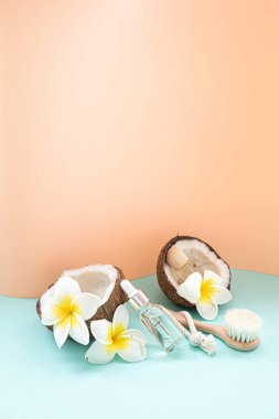 Tropikal arka planda gerekli yağlar. Deri ve vücut bakımı kavramı