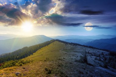 Alacakaranlıkta trakarpatinin yeşil doğası. Gündüz ve gece zaman kavramını değiştirir. Yazın güneş ve ay olan kornohora sırtı dağlarının manzarası. Tepede ladin ormanı olan manzara