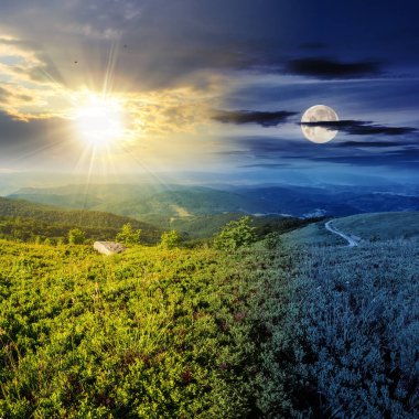 Alacakaranlıktaki çimenli çayır. Tepenin aşağısında, ormanın yakınında, güneş ve ay olan bir köy yolu. Gündüz ve gece zaman kavramını değiştirir. Dağlık kır manzarası Sabah ışığında
