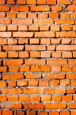 Kırmızı tuğladan bir duvar dokusu. Kirli duvar kalıpları. yeniden yapılanma süreci
