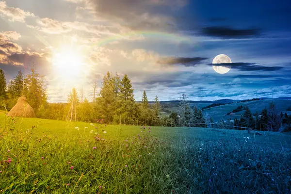 Sonbahar ekinoksunda kırsal alan. Gündüz ve gece değişiyor. Yuvarlanan tepeleri olan kırsal bir manzara. Alacakaranlıkta güneş ve ay olan dağ manzarası. taşra macerası