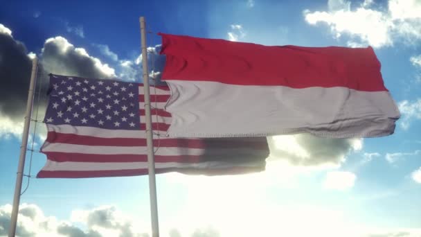 インドネシアと米国は旗竿に旗を掲げている インドネシアと米国の外交概念 青空の背景 — ストック動画