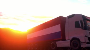 Hollanda bayrağı taşıyan yük kamyonları. Hollanda 'dan gelen kamyonlar depo limanında yükleme veya boşaltma yapıyor..