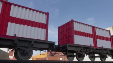 İngiltere bayrağı taşıyan tren ve konteynırlar. Demiryolu taşımacılığı.