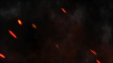 Ateşten uçan közler. Yanan şenlik ateşi kıvılcımlarına yakın. Parçacıkları dumanla siyah arkaplan üzerine ateşle.