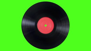 Vinil Plak yeşil ekranda dönüyor. Yeşil ekran arka planında canlandırma video retro plağı.