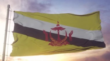 Brunei bayrağı rüzgarda, gökyüzünde ve güneş arka planında dalgalanıyor.
