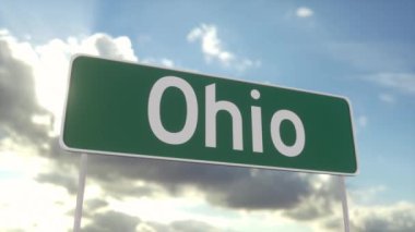 Ohio 'ya hoş geldiniz. Mavi gökyüzünde Ohio yol tabelası. Seyahat, iş, turizm ve ulaşım kavramı.