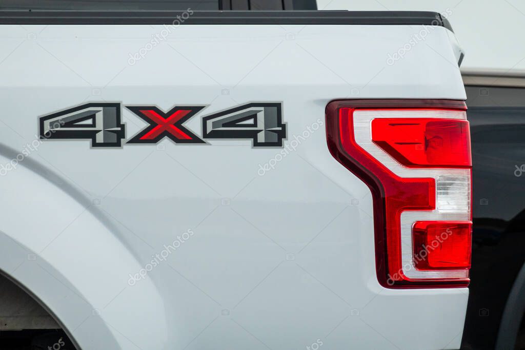 STILLWATER, MN, USA - JULY 16, 2023: Chevrolet Silverado 4x4  close-up and trademark logo.