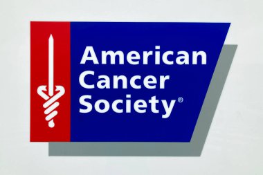 MINNEAPOLIS, MN, USA - SEPTEMBER 12, 2023: American Cancer Society sign and trademark logo. clipart