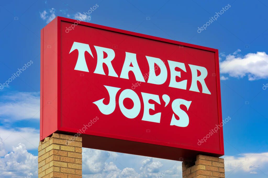 EAGAN, MN, USA - MARCH 7, 2024: Trader Joe's grocery store sign and trademark logo.