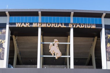 LARAMIE, WY, USA - MAY 13, 2024: War Memorial Stadium at the University of Wyoming. clipart
