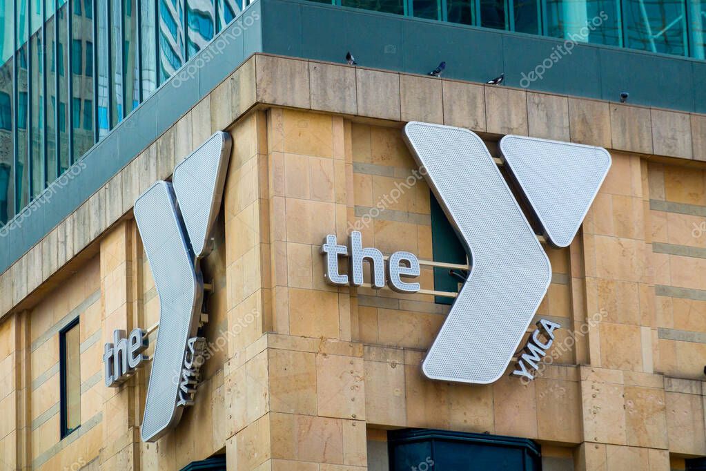 MINNEAPOLIS, MN, USA - AUGUST 25, 2024:Downtown Minneapolis YMCA exterior and trademark logo.