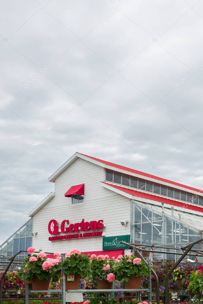 INVER GROVE HEIGHTS, MN, USA, MAY 19, 2025: Main building and trademark logo at Gertens Greenhouses and Garden Center.