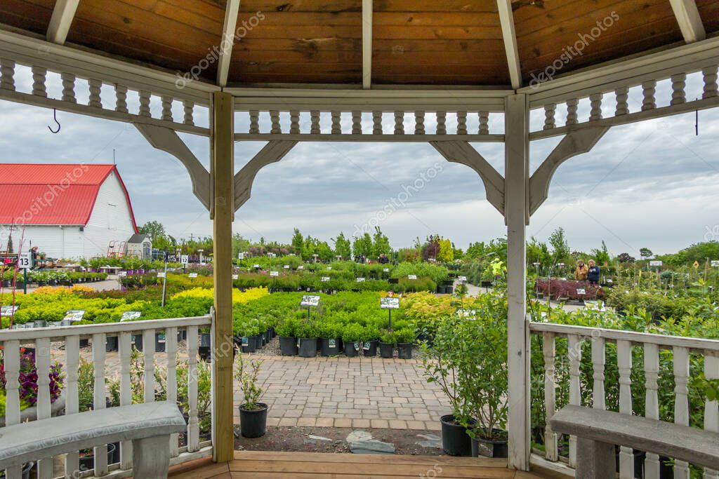 INVER GROVE HEIGHTS, MN, USA, MAY 19, 2025: Gazebo and panoramic views at Gertens Greenhouses and Garden Center.